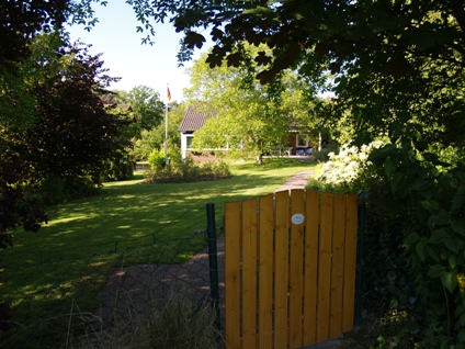 view at the huge garden and holiday cottage with patio